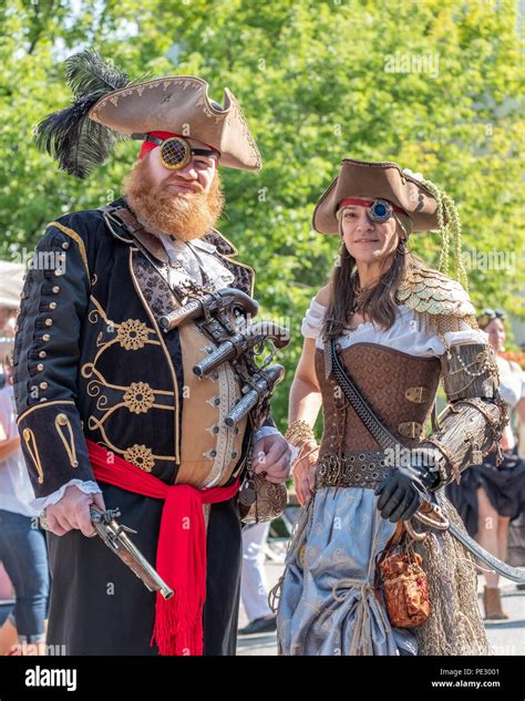 A couple in pirate costumes pose for a portrait at the annual Coldwater ...
