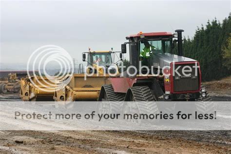 Image result for Bell Scraper Tractor