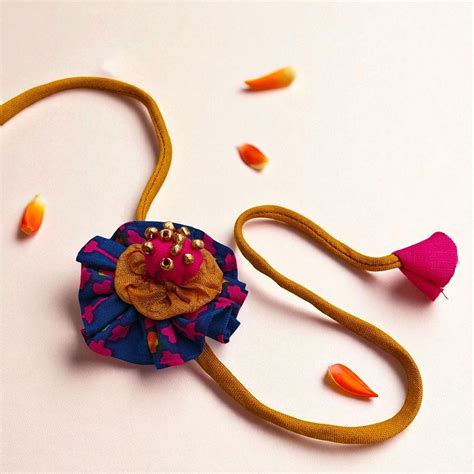 Buy Handmade Beaded Flower Design Upcycled Fabric Rakhi With Roli ...