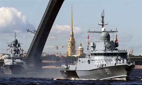 Russian warships sail during the Navy Day parade in Kronstadt near ...