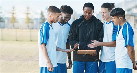 Premium Photo | Sports soccer and a coach talking to team on field for ...