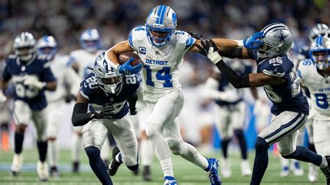 Amon-Ra St. Brown toughs out injury, fuels Lions in key win - ESPN