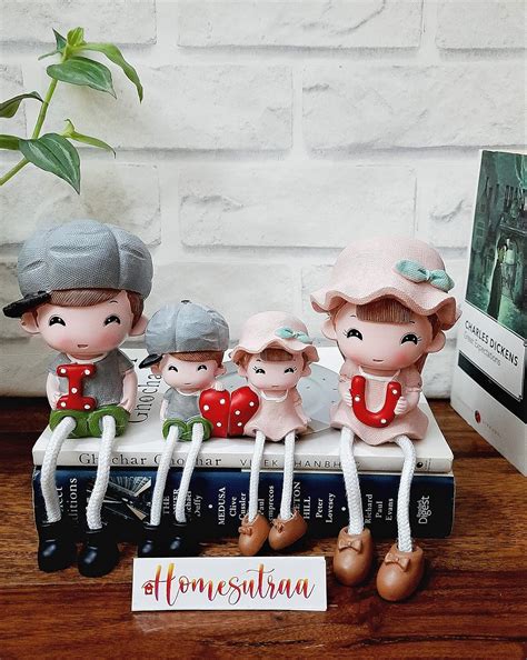 Buy HOMESUTRAA Hanging Legs Showpiece Family Sitting Dolls Miniature ...