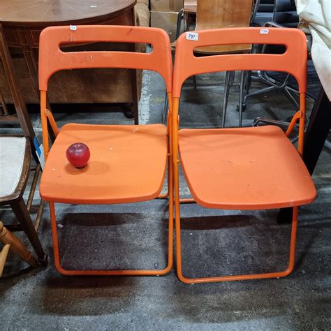 A lovely pair of Italian designer folding chairs.