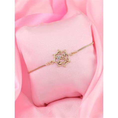 Buy Estele Gold Plated Floral Om Bracelet with Austrian Crystals for ...
