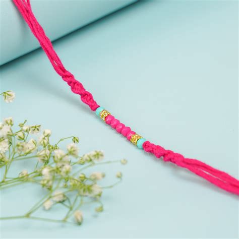 Buy Handmade Beaded Pink Rakhi With Roli Chawal Online On Zwende