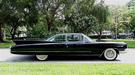 1960 Cadillac Coupe DeVille... Long, Shiny and Black : r/classiccars