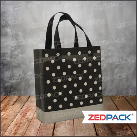 Common Design Non Woven Box Bag - Printed Non Woven Bags Manufacturer ...