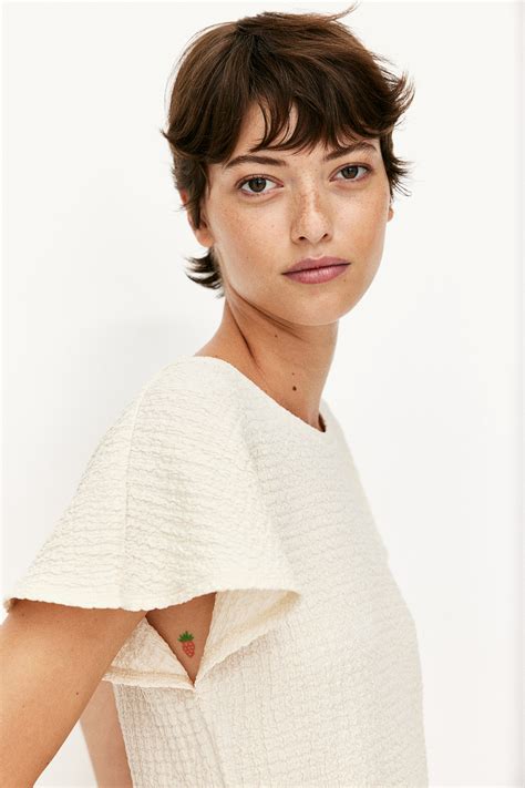 Textured jersey top - Cream - Ladies | H&M IN