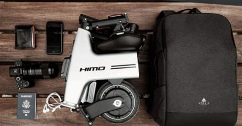 Крошечный электробайк HiMo с легкостью перевезет вас на 30 километров ...