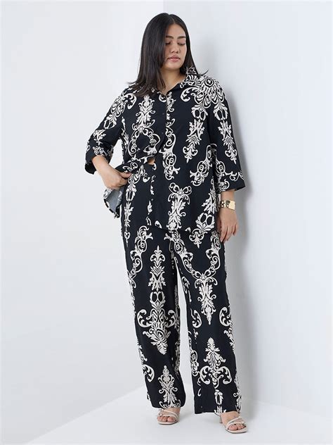 Buy Gia Black Printed Mid-Rise Pants from Westside