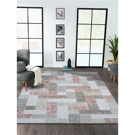 Buy OBSESSIONS Cream and Grey Solid Machine Made Rectangular Carpet Online