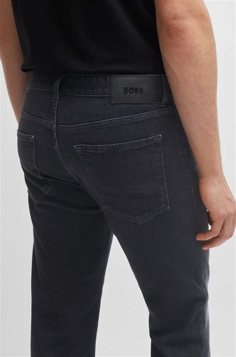 BOSS - Regular-fit jeans in black Italian cashmere-touch denim