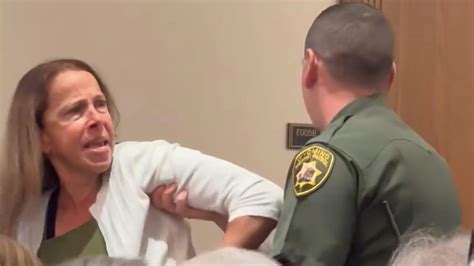 Law Enforcement Physically Removes Woman From Board Of Pharmacy Meeting ...