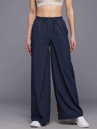 HRX by Hrithik Roshan Solid Women Blue Track Pants - Buy HRX by Hrithik ...