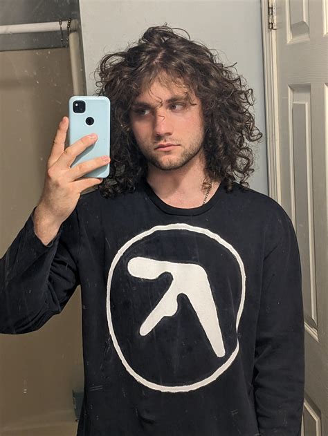 I made my own aphex twin shirt with an old sweatshirt and fabric paint ...