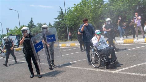 Turkish police knock protesting opposition MP out of wheelchair