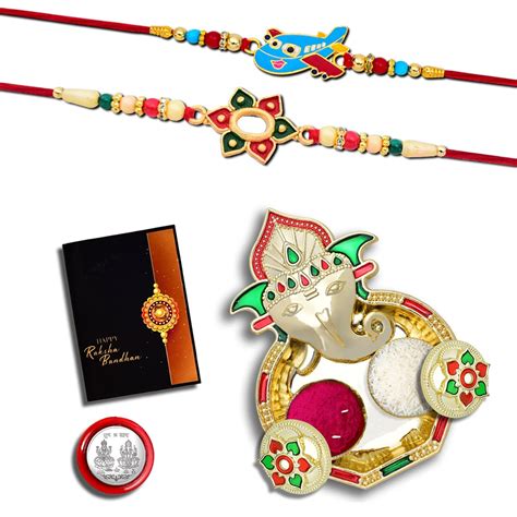 Buy Rakhi with Pooja Coin, Shri Ganesh Pooja Thali / Tilak Set ...