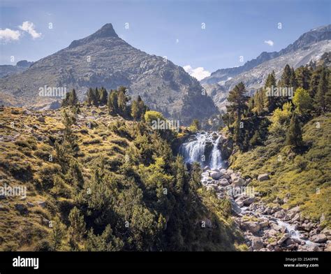 Enchanting cascading waterfall amidst trees hi-res stock photography ...