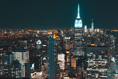 Download New York City At Night Wallpaper | Wallpapers.com
