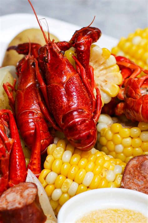 Louisiana Crawfish Boil Recipe with Garlic Butter Sauce - IzzyCooking