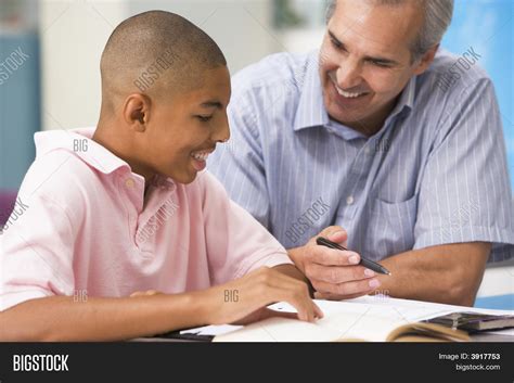 Teacher Giving Personal Instruction Image & Photo | Bigstock