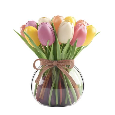 Colorful tulips arranged in a clear glass vase for decorative appeal in ...