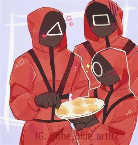 two people in red suits holding a plate of food and looking at ...