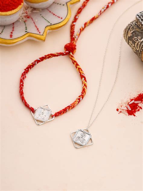 Buy Good Luck Motif Silver Rakhi Pendant