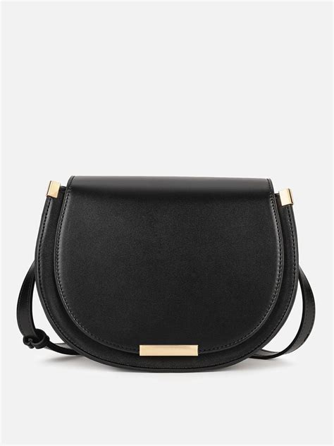 Harriet Black Sling by IRTH | House Of Titan | Shop Online
