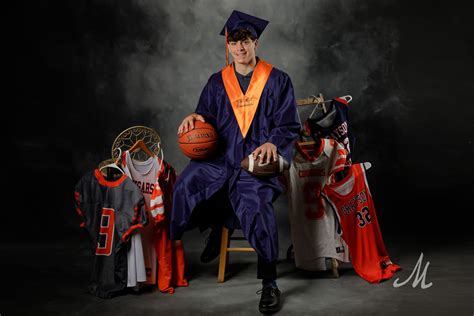 Senior guy sports and cap and gown | Senior pictures boys, Graduation photography poses, Senior ...