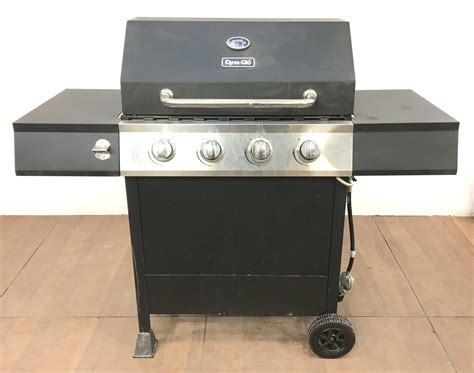 Lot - Dyna-Glo 4-burner Propane Gas BBQ Grill