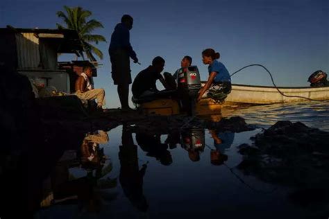 Rising sea levels force Fiji's villagers to relocate; see pics ...
