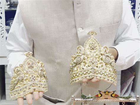 Surat jewelers will prepare to welcome Bal Gopal tonight,Gold cradles ...