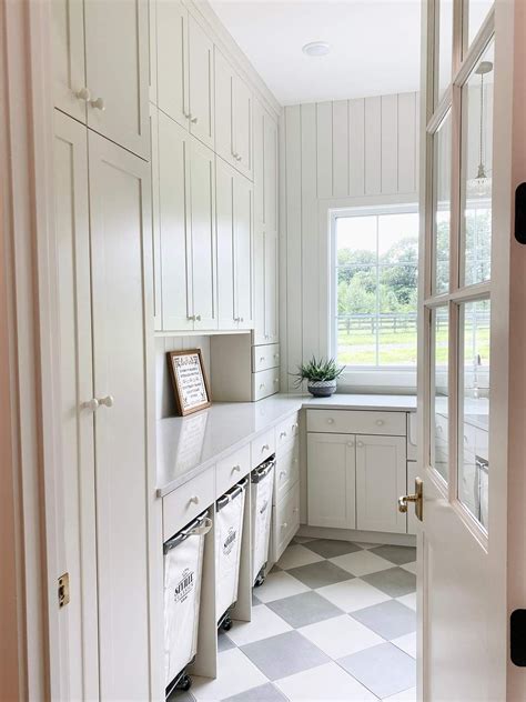 White Laundry Room with Checkered Flooring