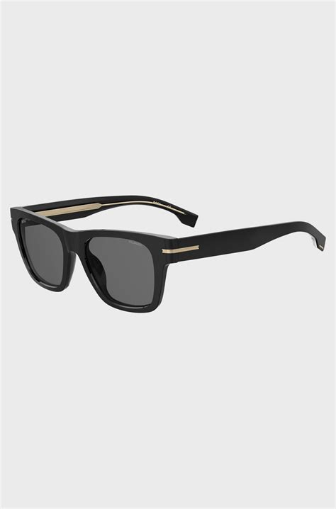 BOSS - Black sunglasses with gold-tone details - Black