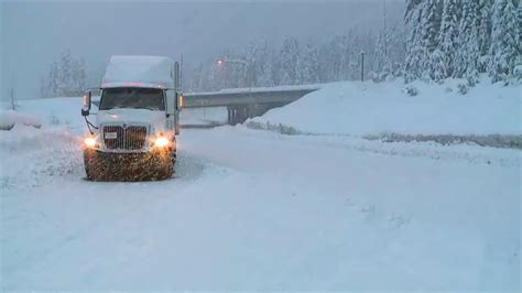 Storm prompts mountain pass closures; falling tree takes out power ...