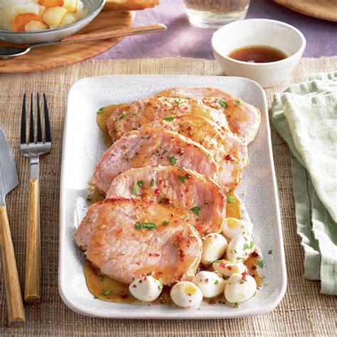 Filetes de lomo de cerdo con ajos confitados