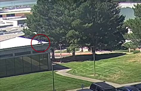 Watch: FBI releases new video of suspect running across rooftop after ...