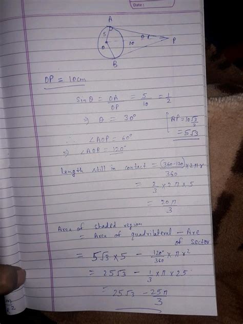 An elastic belt is placed around the rim of a pulley of radius 5 cm ...