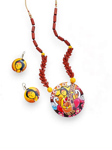 Spiritual Symphonies- Hand-Painted Maa Saraswati Devi Terracotta Jewel ...