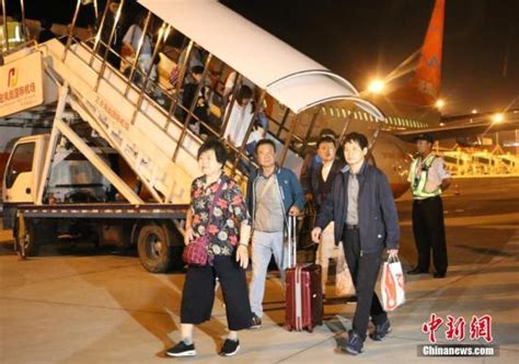 海南“59国免签新政”实施 首批免签游客飞抵三亚 - 中国日报网