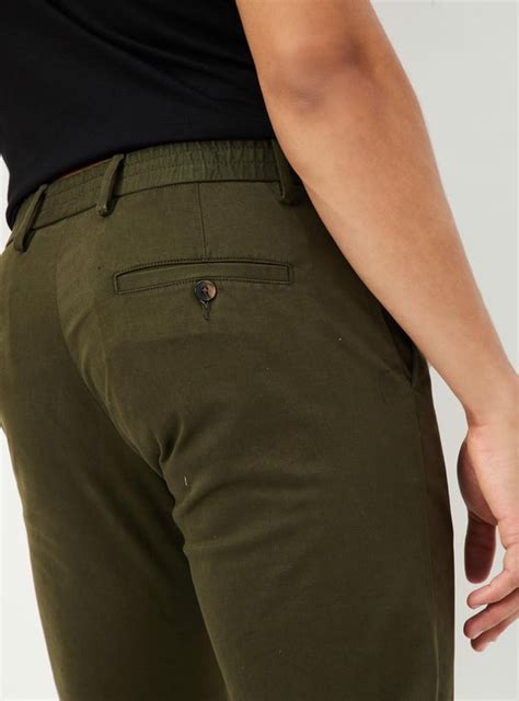 Buy Men Slim Fit Solid Casual Trousers Online at just Rs. 1399.0 ...