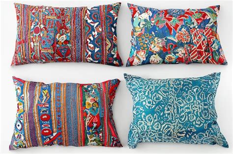 Stylish colorful pillows with various designs on a white background ...