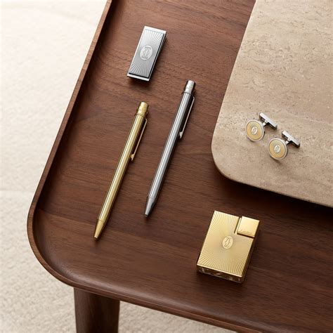 Double C de Cartier logo square lighter with Sunray motif in yellow ...