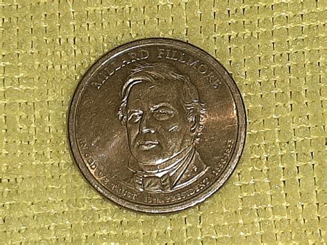 Millard Fillmore Presidential Coin. One dollar | Collectors Weekly