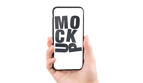 Hand holding smartphone with mock up text on screen | Premium PSD