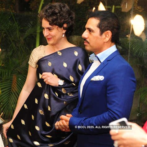 Priyanka Gandhi and Robert Vadra pose with the couple during the ...
