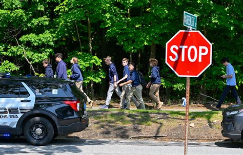 Hoax shooting at Massachusetts school caused chaos. Then a cop ...
