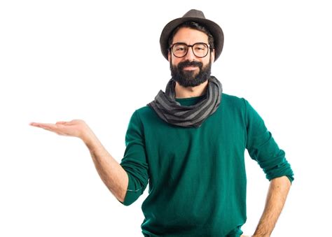 Man holding something | Free Photo